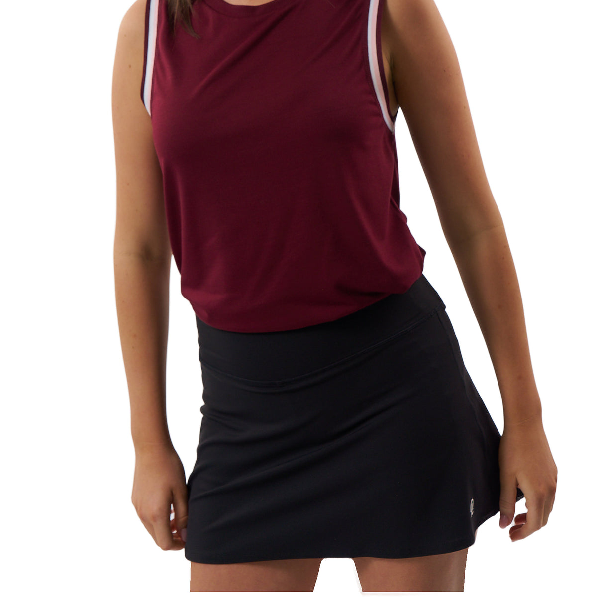 A woman wearing a sleeveless athletic tank top in burgundy with white shoulder stripes and a black tennis skirt, shown from the shoulders to the upper thighs against a plain white background.